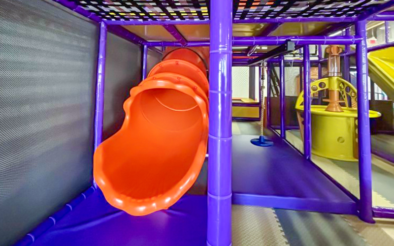 Staff preparing indoor playground for a weekend event promotion